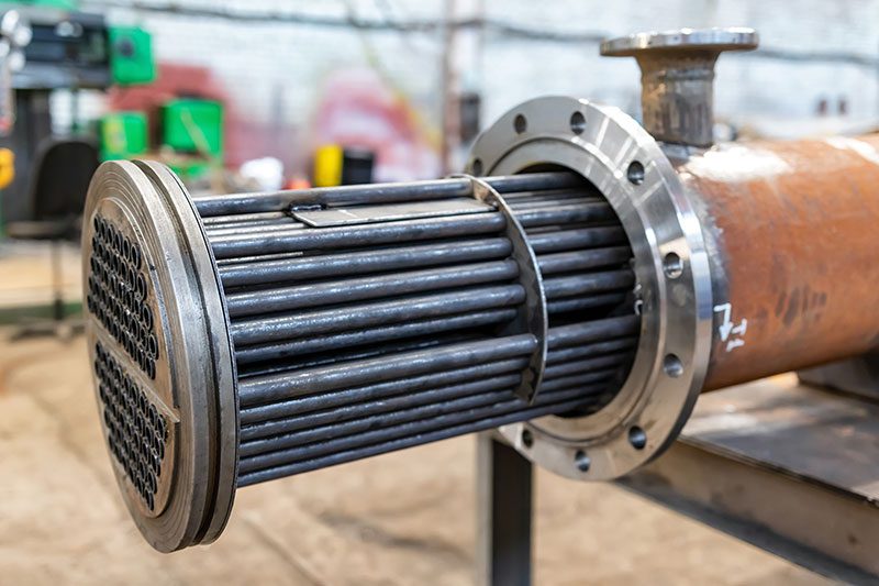 Fluid allocations in shell and tube heat exchangers