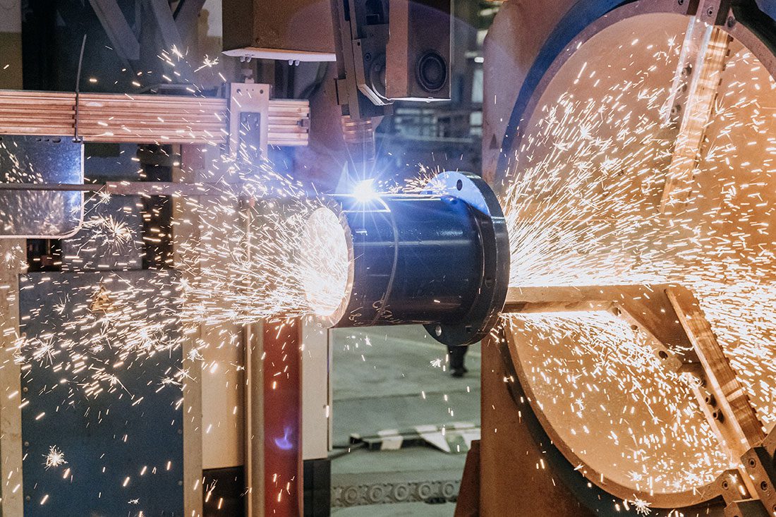  CNC automated profiling of a nozzle using a multi-axis head machine.