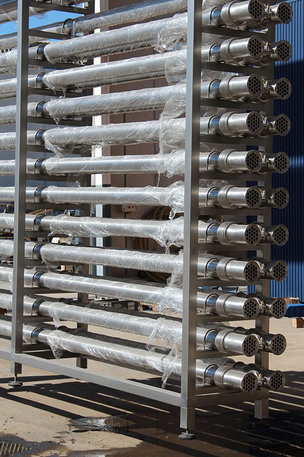 Because of the highly corrosive nature of the sodium chloride-rich brine the heat exchangers have been constructed from titanium rather than stainless steel