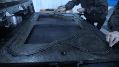 Primary vulcanization process at the HFM factory, molding raw rubber into durable gaskets