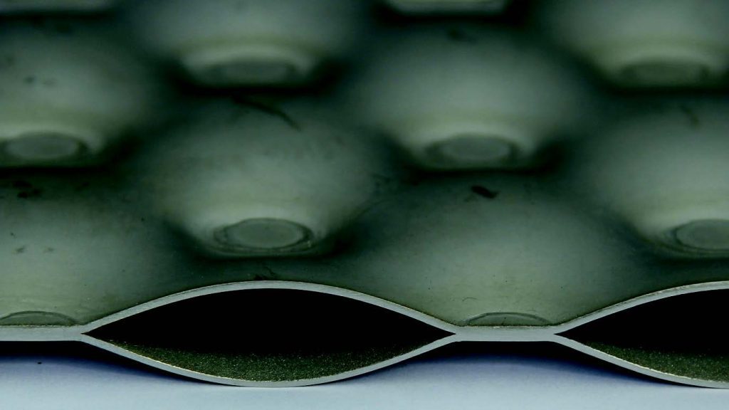 Double embossed plate.