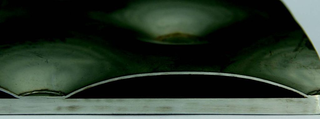 Single embossed plate.