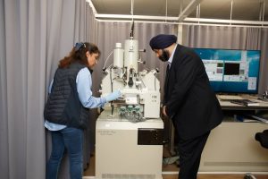 Barinder Ghai and Nazanin Hosseini analyzing tube samples in the Electron Probe Micro-Analyzer.