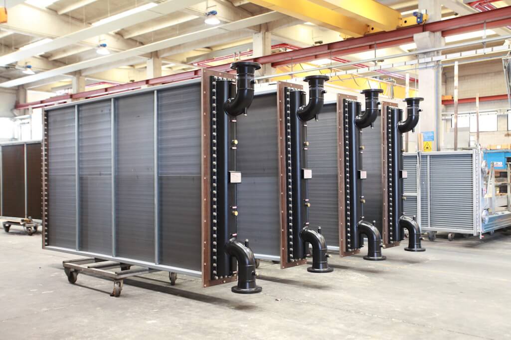 Water box cleanable coolers for O&G electrical motors