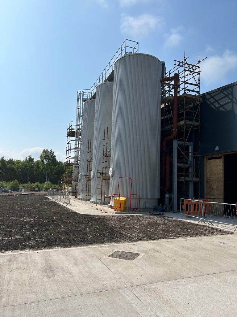 Thermal storage vessels that each store 100,000L hot water (and space for a future 4th) to satisfy peak demand for the heat network.