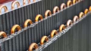 Coatings play a vital role in protecting heat exchangers from corrosion, serving as a barrier between the metal surface and the corrosive environment. Photo: Dreamstime