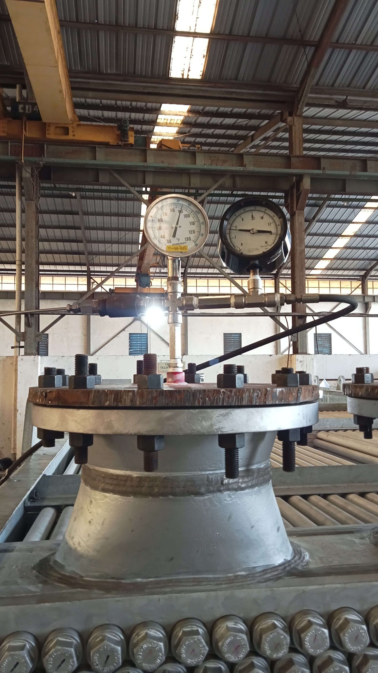 Closeup of pressure gauges for hydrotesting of heat exchangers. Image courtesy of Tiga Ombak, Cortec® Case History 852.