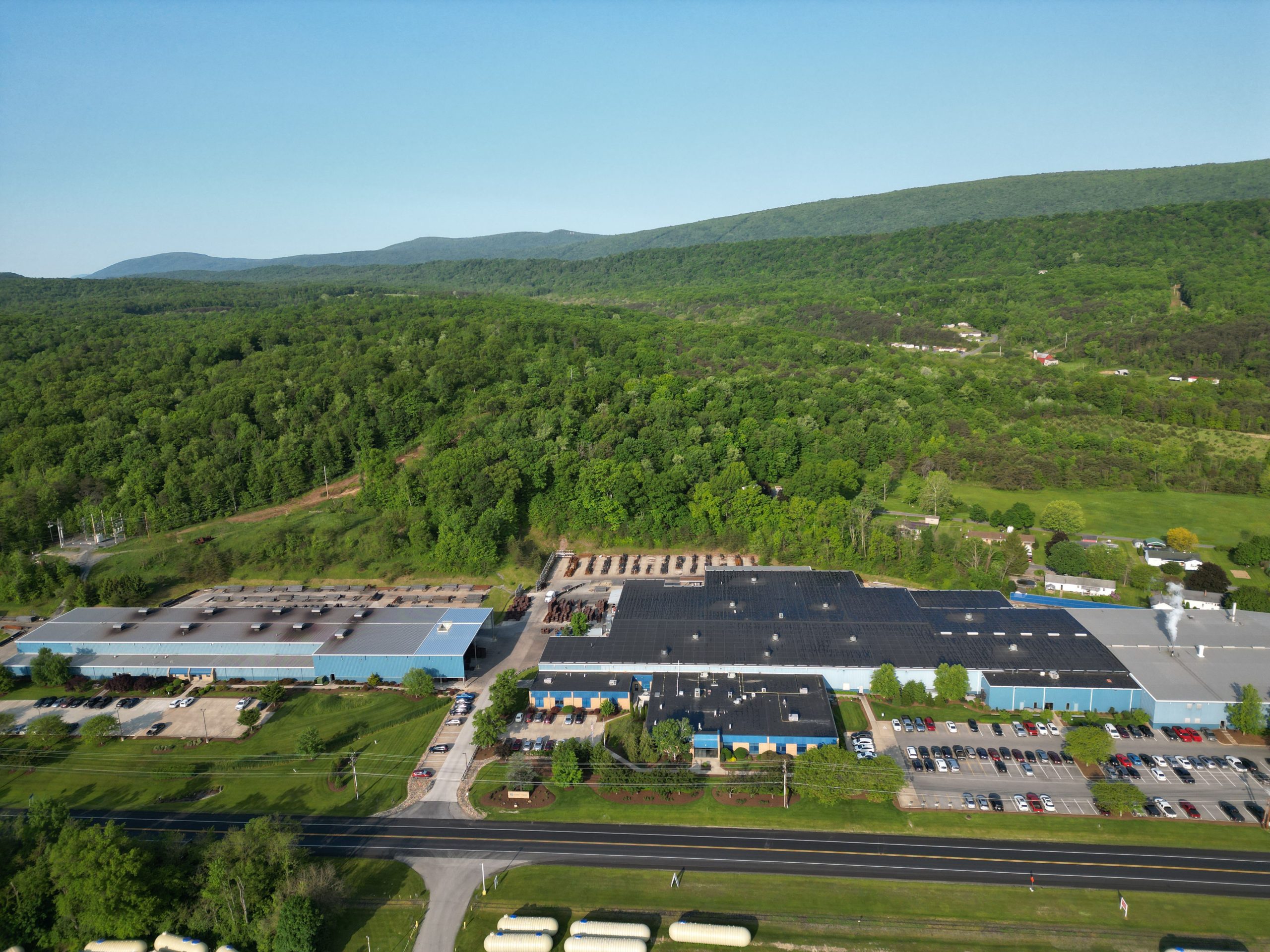 Overhead glimpse of a portion of Bonney Forge corporate headquarters located in Mount Union, PA. The manufacturing facility and warehouse stretches over 320,000 sq. ft. on 60+ acres of land.