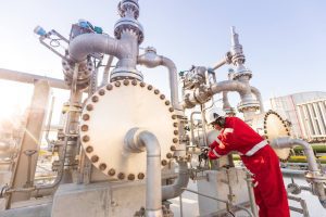 Shell’s LNG regasification terminal in Gibraltar. An inspector checks the gas pressure gauge of the evaporator. Photo: Shell.