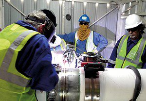 Figure 3. Heavy-walled pipes welded with narrow groove preparation and open-type carriage welding head