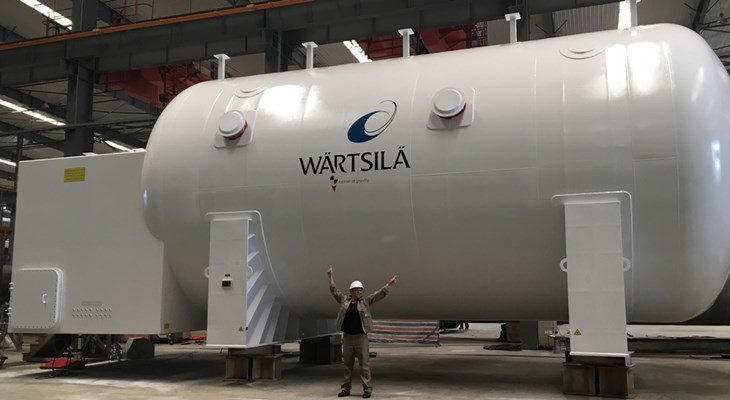 Project Manager Mariangela Trocini pictured with a LNGPac, ready for delivery to the Visentini 224 RO-PAX ship. The ship has two LNG fueled engines with a capacity for 810 passengers, 150 cars and car