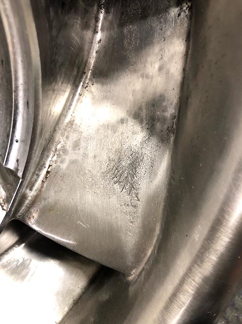 Picture 1: Before the repair the vane showed cavitation marks.