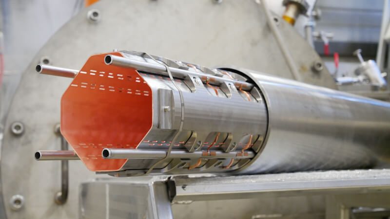 Figure 1. Complex shape beam screens for the HL-LHC triplet magnets in a high Mn – high N grade specially developed for the LHC beam screens, equipped of four seamless cold-drawn cooling tubes in the same grade and inserted into their 316LN cold bores. Image courtesy of CERN.