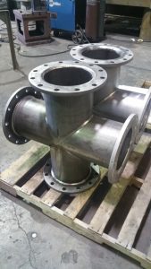 Four-way connectors fabricated entirely from Ferralium super duplex plate.