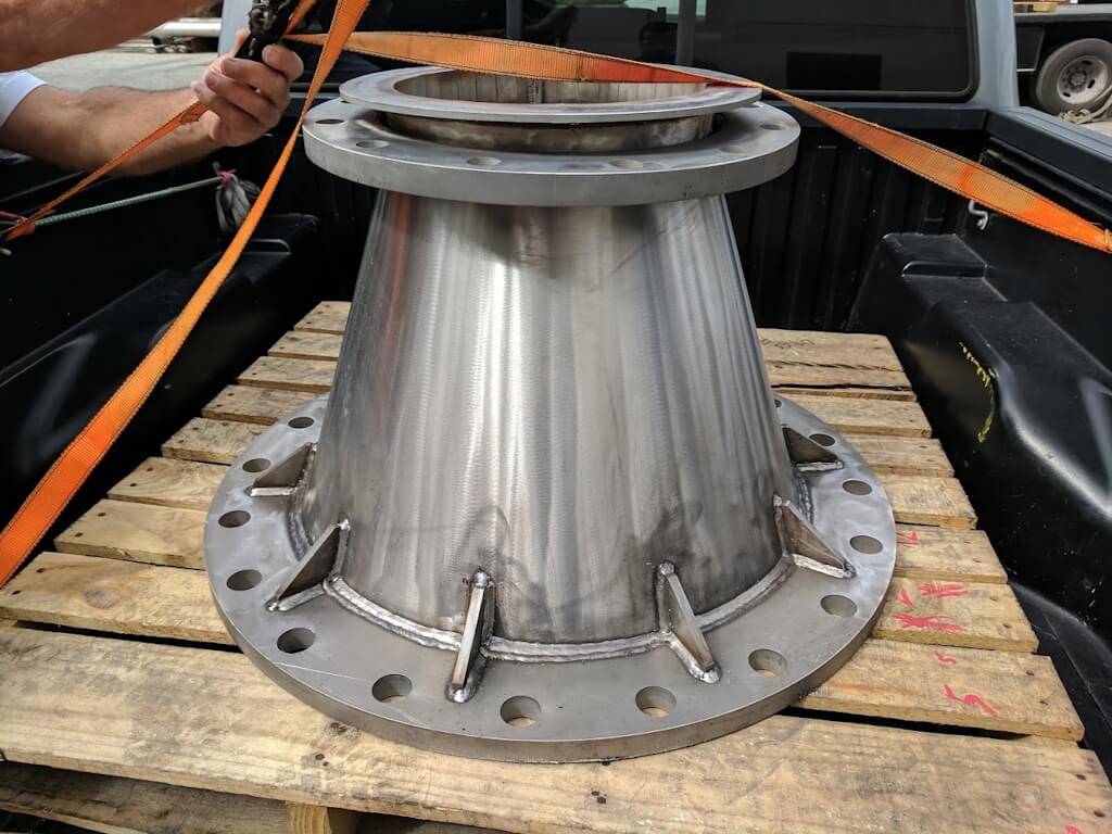 A pipework reducer, stepping between sections of different diameters