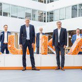 KUKA und T-Systems schließen Partnerschaft KUKA und T-Systems schließen Partnerschaft